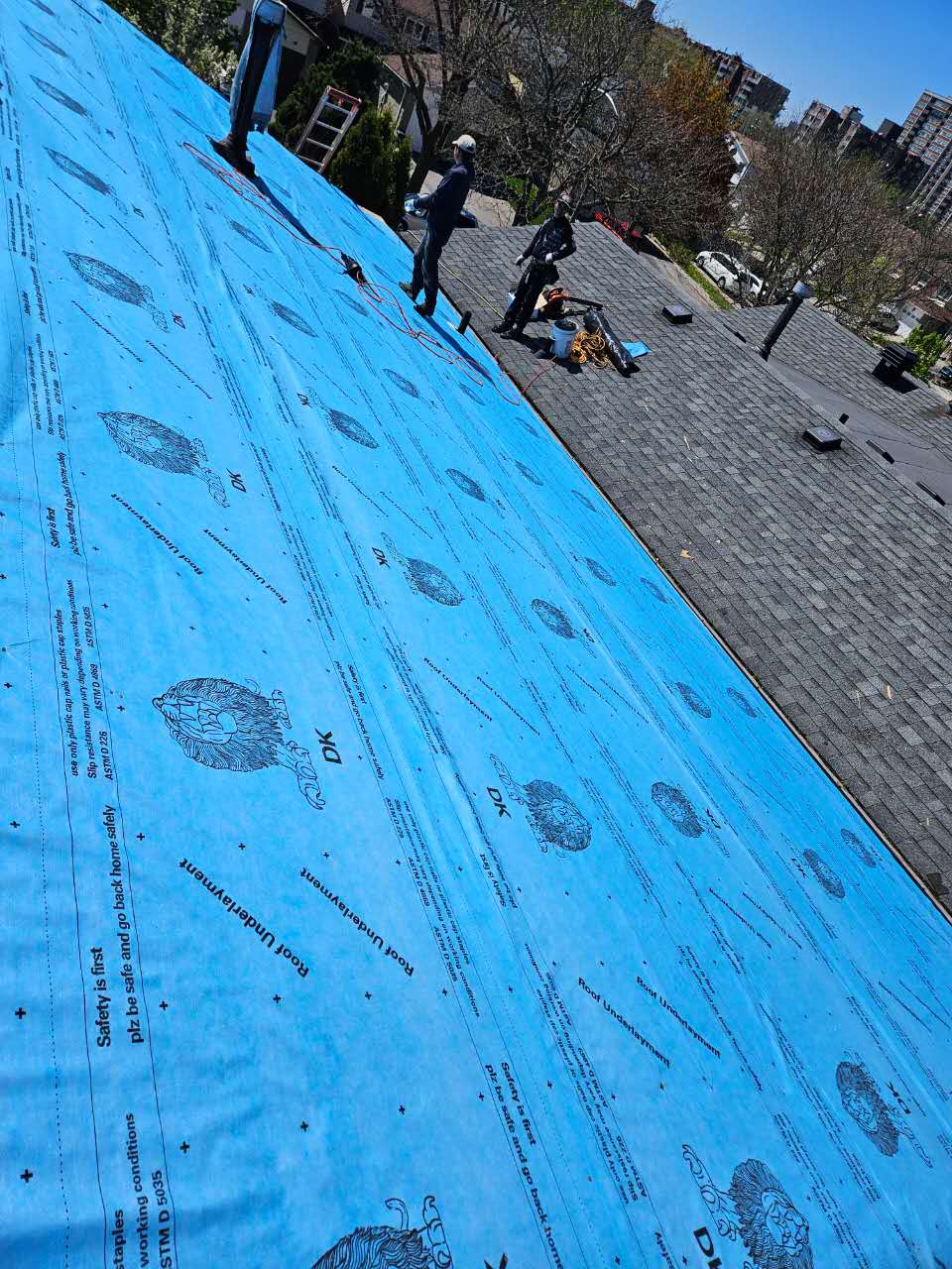 Blue roof underlayment installed before shingles